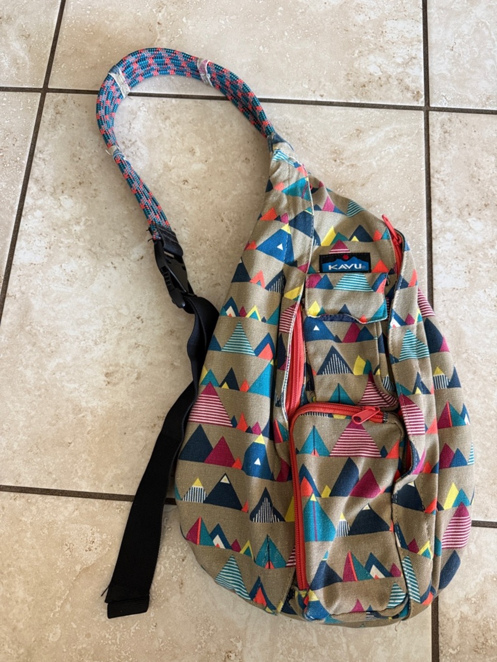 Kavu Tan Geo Pattern Sling Bag with Coral Zippers